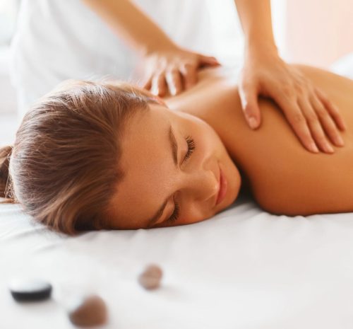 spa-woman-female-enjoying-massage-in-spa-centre-royalty-free-image-492676582-1549988720